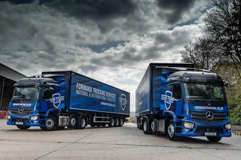 Pair of FTS lorries with matching wraps